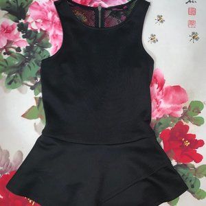 Material Girl black peplum tank + mesh back design